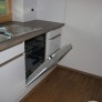 Kueche-Rosenheim-Weiß-Hochglanz-Edelstahlgriff-Siemens-Elektrogeraete-Schreinerei-Hoehensteiger-Geschirrspueler